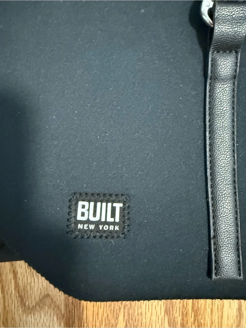 BUILT NEW YORK neoprene city backpack w/ inside and outside pockets. Pink inside